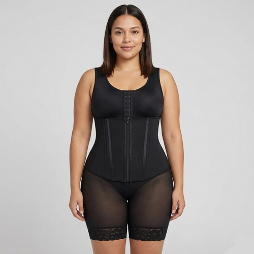 Woman wearing a black waist trainer against a gray background