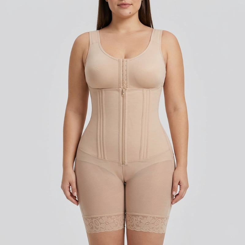 Beige shapewear bodysuit worn by a model on a light gray background